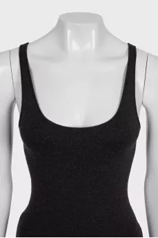 A tight-fitting black tank top with thin straps