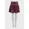 Red leather skirt