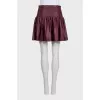 Red leather skirt