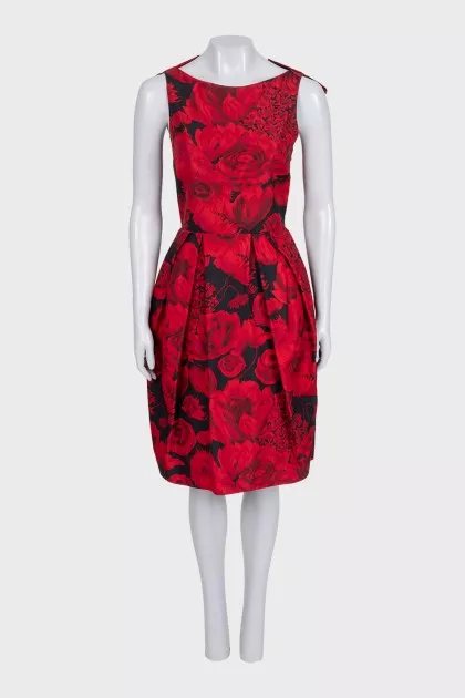 Black dress with a floral print decorated with bows
