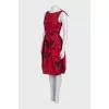 Black dress with a floral print decorated with bows
