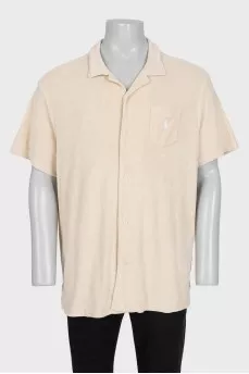 Men's beige button-down polo shirt
