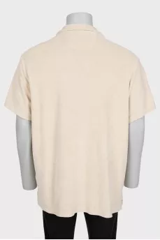 Men's beige button-down polo shirt