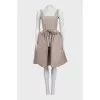 Gray dress with tie-up peplum