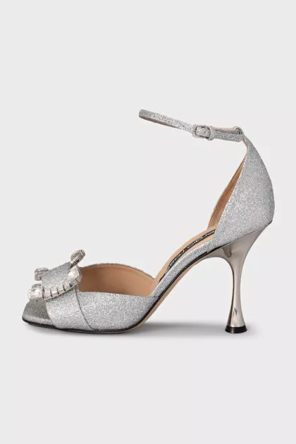 Shiny sandals with a figured heel