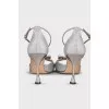 Shiny sandals with a figured heel
