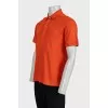 Men's orange polo shirt with buttons