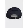 Men's blue cap with a brand logo