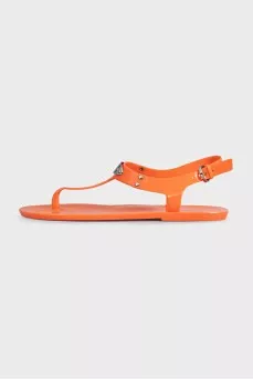 Orange rubber flip flops