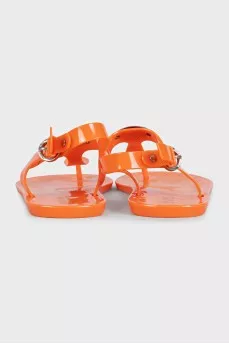Orange rubber flip flops