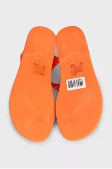 Orange rubber flip flops