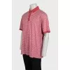 Men's red striped polo shirt with tag