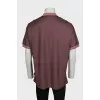 Men's polo shirt with red buttons