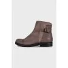 Men's brown leather boots with a zipper