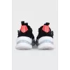 Black sneakers decorated with butterflies