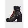 Leather ankle boots with gold embroidery