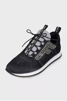 Black sneakers decorated with rhinestones