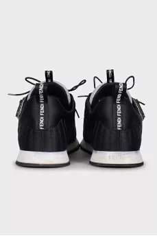 Black sneakers decorated with rhinestones