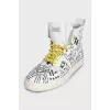 Men's white high-top sneakers with a print