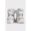 Men's white high-top sneakers with a print