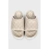 Beige canvas slides with tag