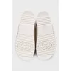 Beige canvas slides with tag