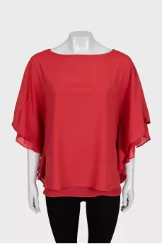 Red blouse with ruffles on the sleeves