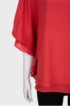 Red blouse with ruffles on the sleeves