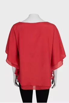 Red blouse with ruffles on the sleeves