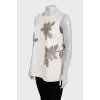 Beige short-sleeved blouse decorated with sequins