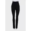 Black high-waisted trousers with rhinestones