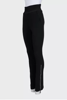 Black high-waisted trousers with rhinestones