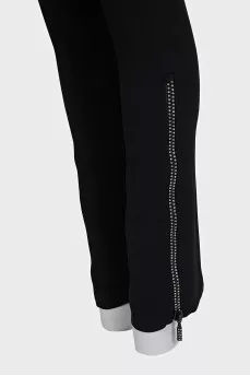 Black high-waisted trousers with rhinestones