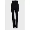 Black high-waisted trousers with rhinestones