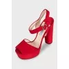Red suede sandals with chunky heels