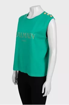 Green T-shirt with gold print