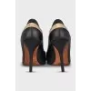 Leather pumps with metallic embellishments