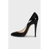 Black patent leather high heel shoes