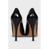 Black patent leather high heel shoes
