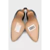 Black patent leather high heel shoes