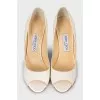 Beige sandals with a gold wedge heel