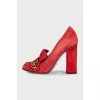 Red suede shoes with fringe