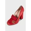 Red suede shoes with fringe