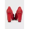 Red suede shoes with fringe