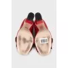 Red suede shoes with fringe