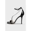 Patent leather sandals with a rhinestone strap