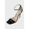 Patent leather sandals with a rhinestone strap