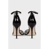 Patent leather sandals with a rhinestone strap