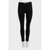 Black skinny jeans with embroidery