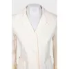 Yellow jacket with ruffles on the sleeves